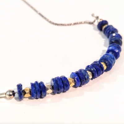 SM-316 SS Adjustable Bracelet with Faceted Lapis Lazuli