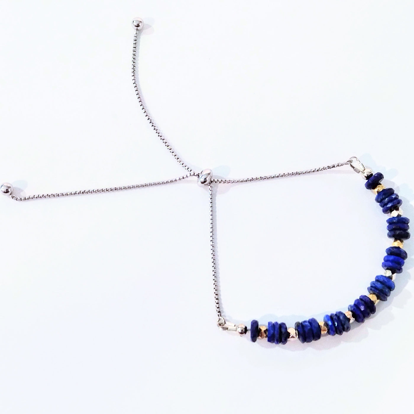SM-316 SS Adjustable Bracelet with Faceted Lapis Lazuli