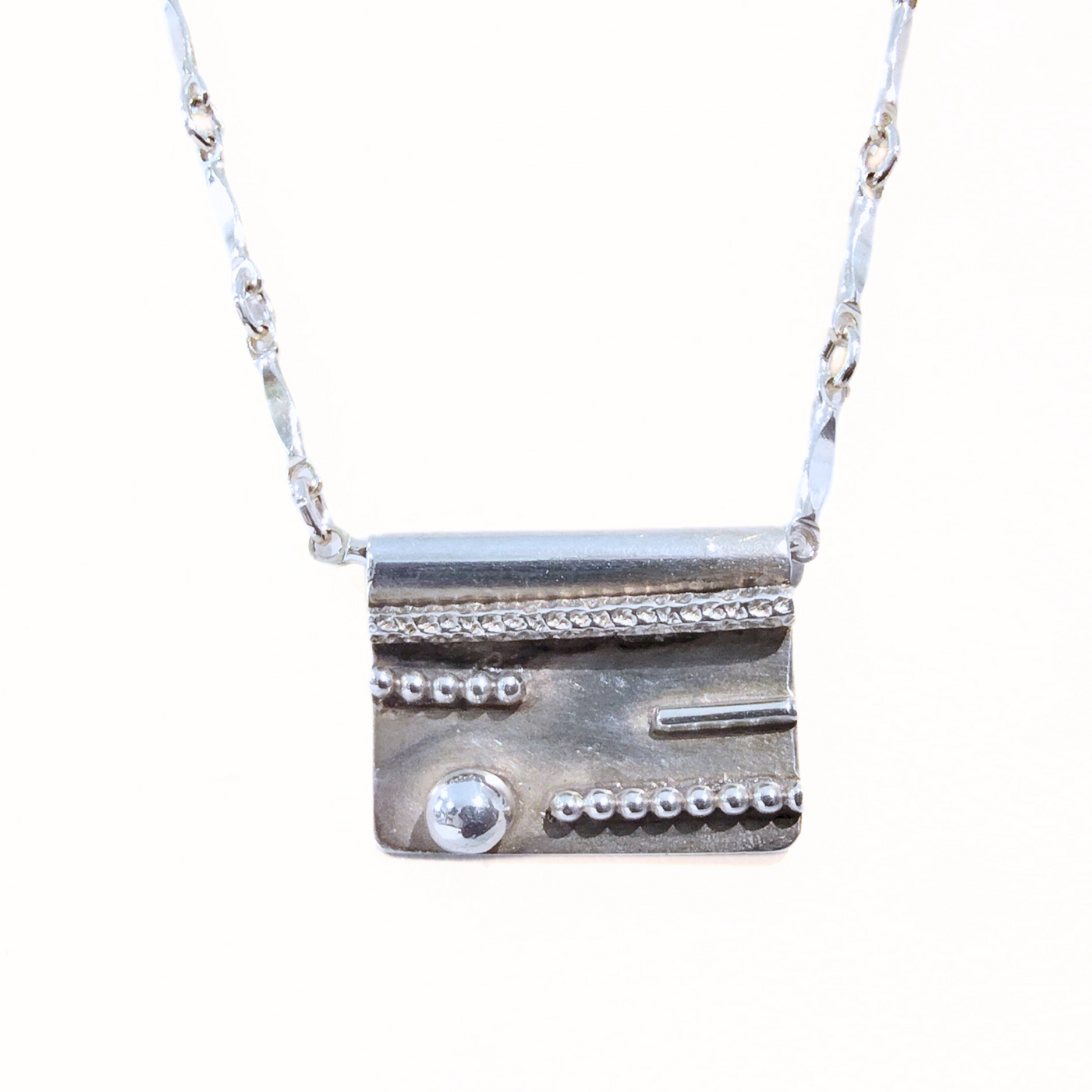 RB2-005 SS Rectangle Pendant with Dotted Lines